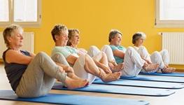 group of women doing yoga